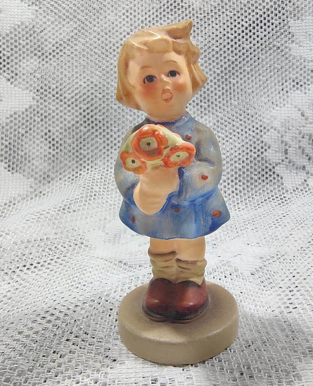Porcelain Vintage Goebel Hummel Figurine. Little Girl With A Flower 1972.